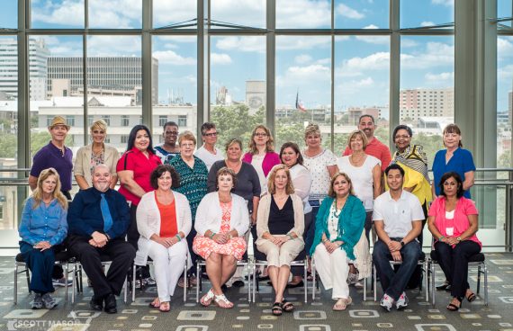 a posed group photo for a conference at the Austin Convention Center