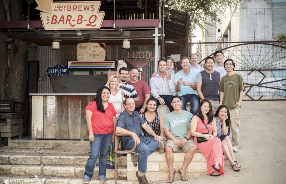 A posed corporate event group photo at Stubb's BBQ