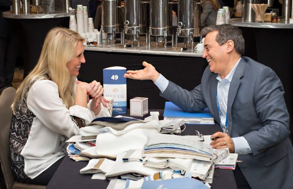 hotel industry execs chat at a speed networking event