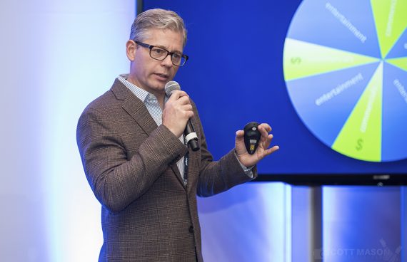 a photo of a speaker giving a keynote presentation
