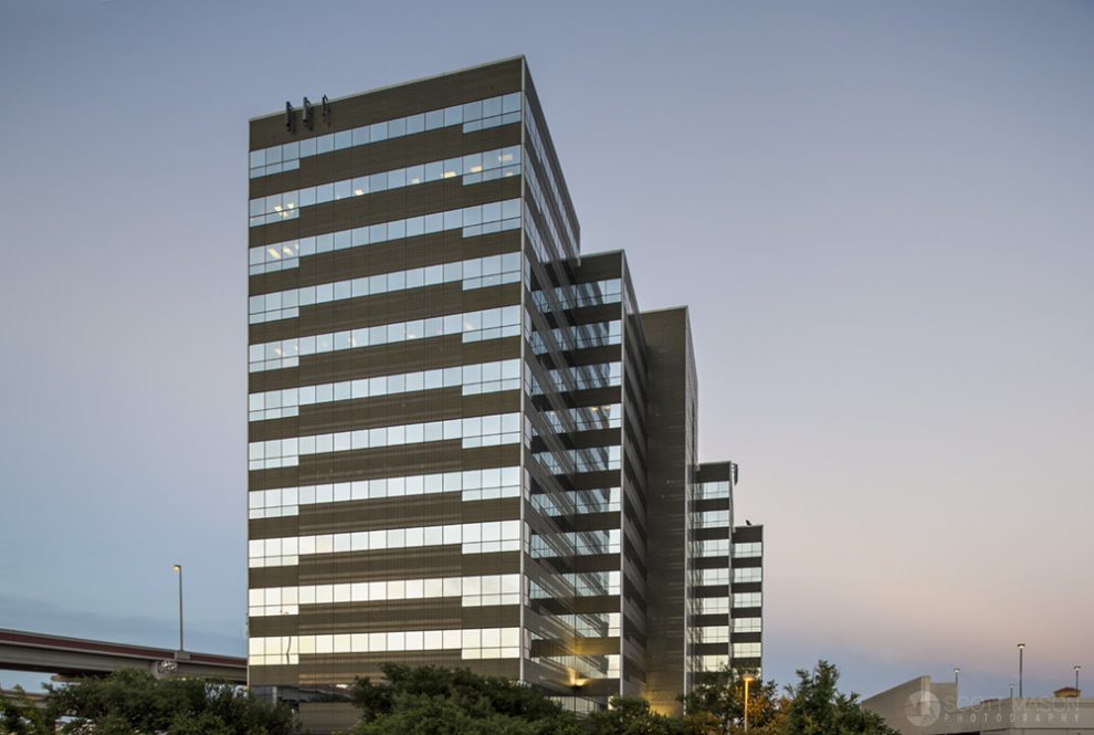 a sunset architectural photo of the exterior of One International Center building in San Antonio