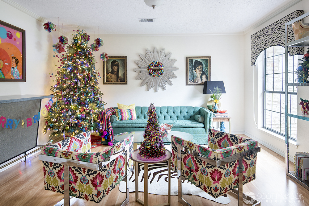 a room with vintage furniture and christmas decor