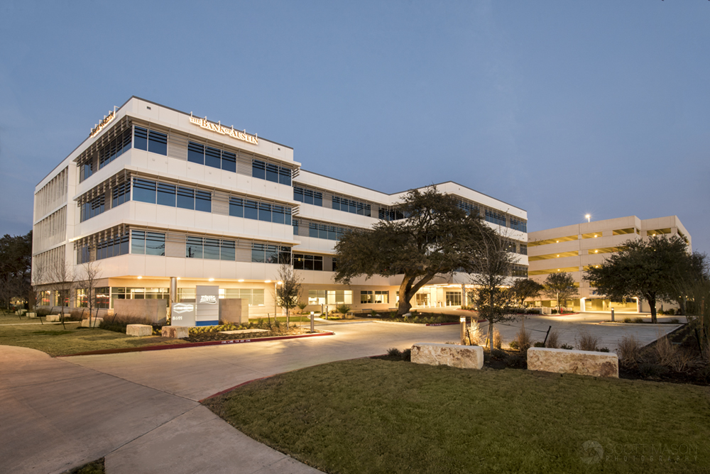 an exterior architectural photo of Mopac Centre in Austin at twilight