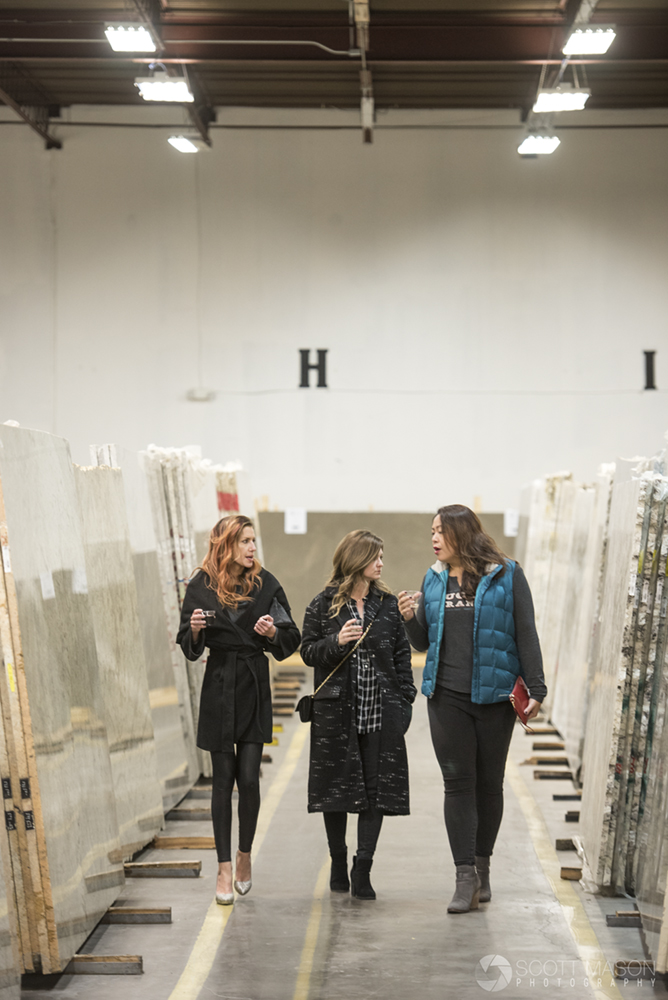 attendants at an event in the Pacific Shore Stones warehouse in Austin