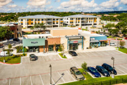 an aerial photograph of an shopping center in Austin