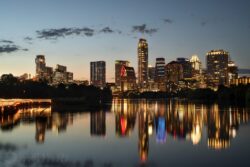 the Austin skyline at twilight, with ladybird lake
