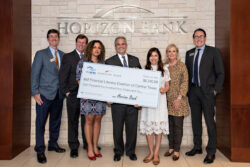 Austin Mayor Adler and FHL Bank at a check presentation event