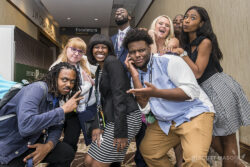 a goofy photo of a group posing in the hallway at a conference in the JW Mariott Austin